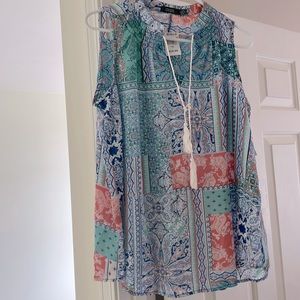 Woman’s 1X sleeveless top. NWT